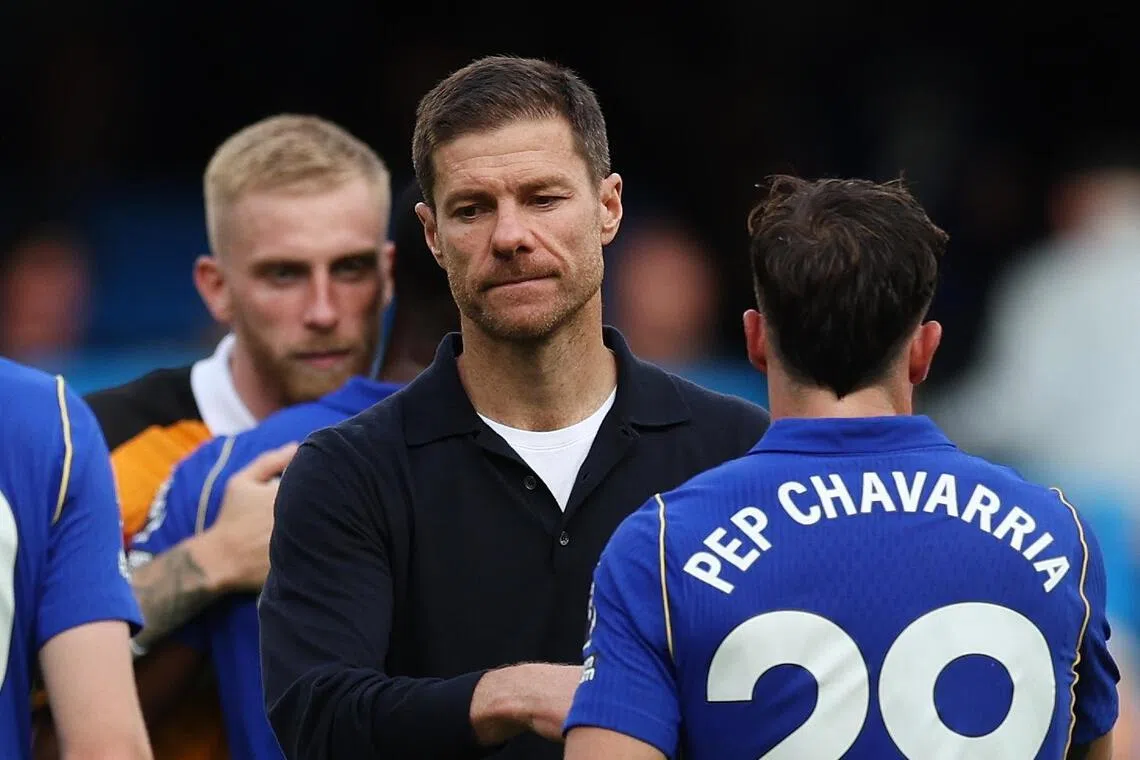 Chelsea manager Xabi Alonso walking on the pitch on Sept 12 after his side’s 2-2 draw against newly promoted Hull.