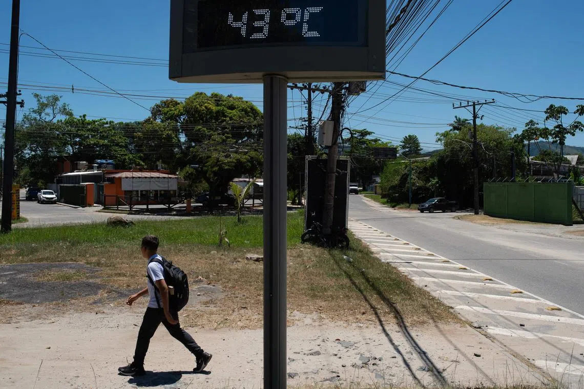 A clock shows the temperature of 43 deg C amid a heatwave in the Guaratiba neighbourhood in Rio de Janeiro, Brazil on Feb 17, 2024.