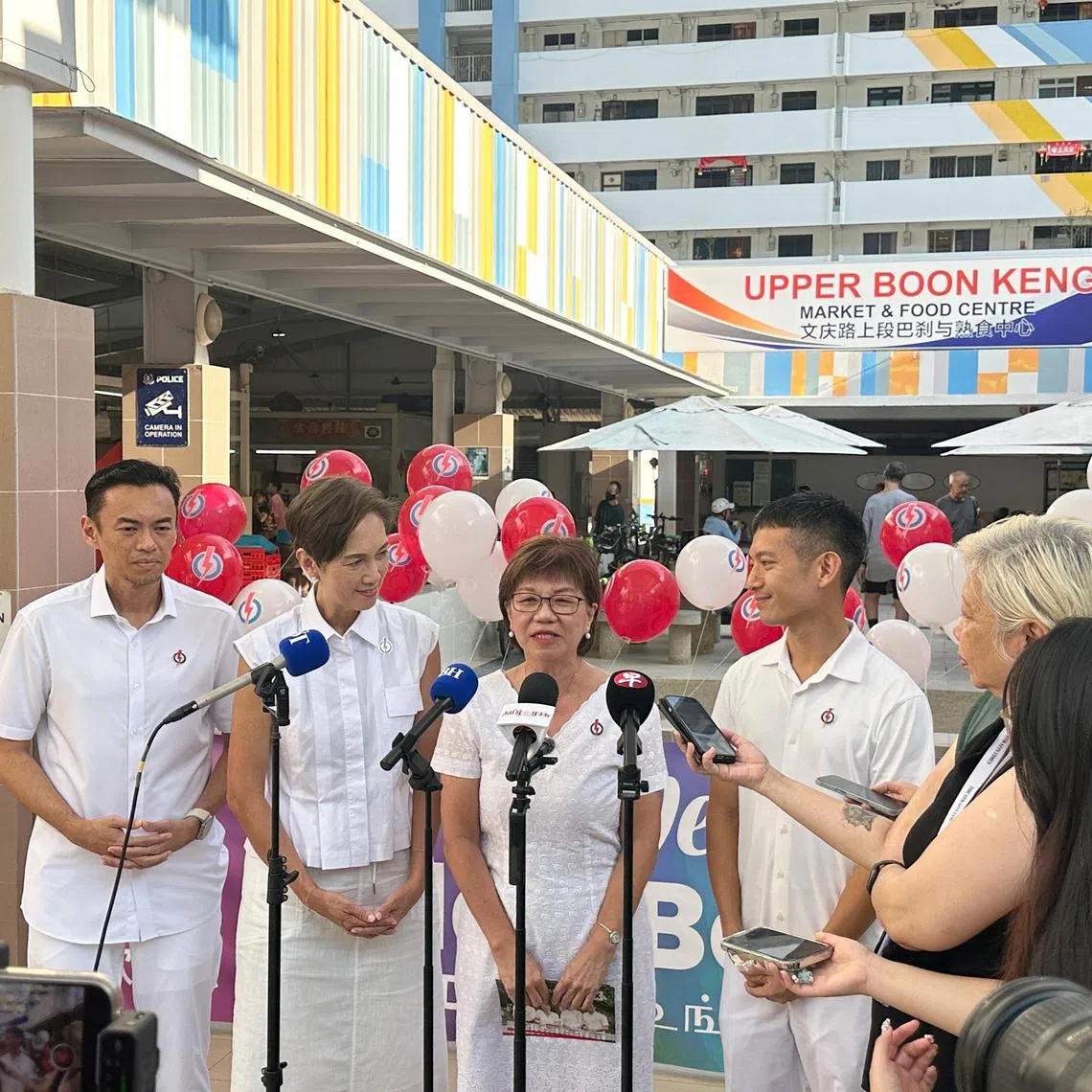PAP candidate for Jalan Besar GRC Denise Phua defended the relevance of mayors and CDCs at a door stop beforte the PAP team went on its walkabout at Upper Boon Keng Market on April 27, 2025 .