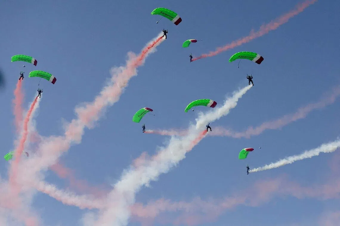 Indonesian military personnel perform skydiving during a ceremony marking the country's 81st Independence Day at the Presidential Palace in Jakarta, Indonesia, August 17, 2026. REUTERS/Ajeng Dinar Ulfiana TPX IMAGES OF THE DAY