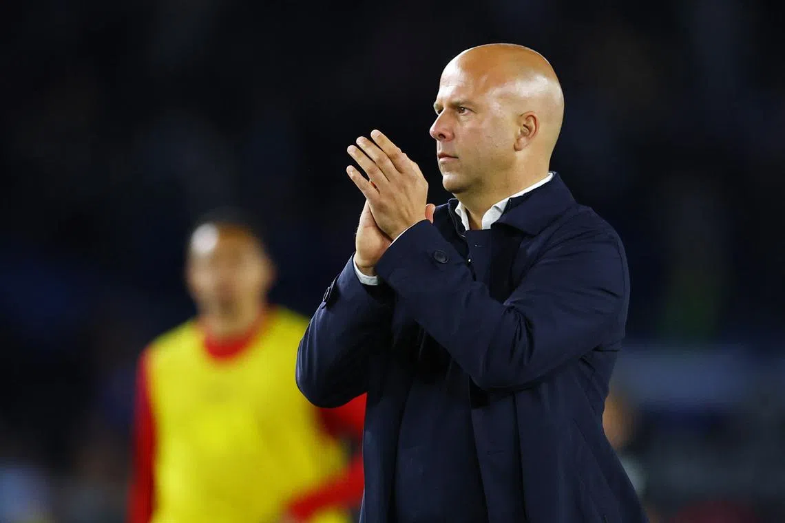 FILE PHOTO: Soccer Football - Premier League - Brighton & Hove Albion v Liverpool - The American Express Community Stadium, Brighton, Britain - May 19, 2025 Liverpool manager Arne Slot looks dejected after the match Action Images via Reuters/Matthew Childs/File photo