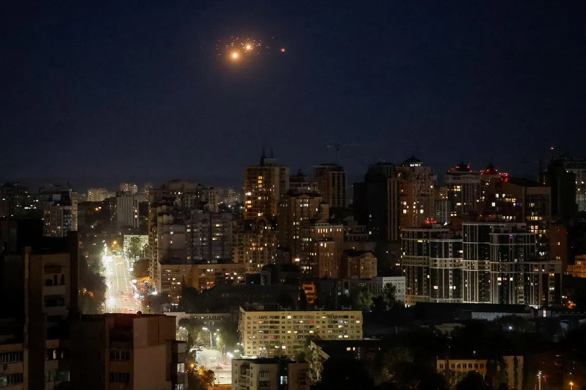 An explosion is seen in the sky during a Russian drone strike, amid Russia's attack on Ukraine, in Kyiv, Ukraine October 17, 2024. REUTERS/Gleb Garanich/File Photo