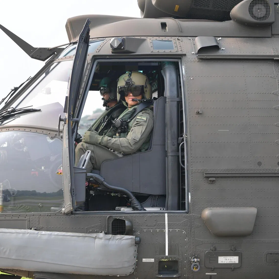 Brunei’s Prince Abdul Mateen on board the Republic of Singapore Air Force’s H225M medium-lift helicopter during his visit to Singapore Armed Forces’ Special Operations Task Force in Singapore on Oct 23.