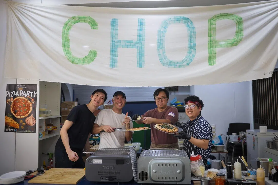 (From left) Volunteers including Shaun Ng, The Chop Community’s community manager Abel Fam, founder of ground-up initiative Food for Soul, Solomon Kang, and Ngoh fed about 90 people at the pizza party on Sept 19.