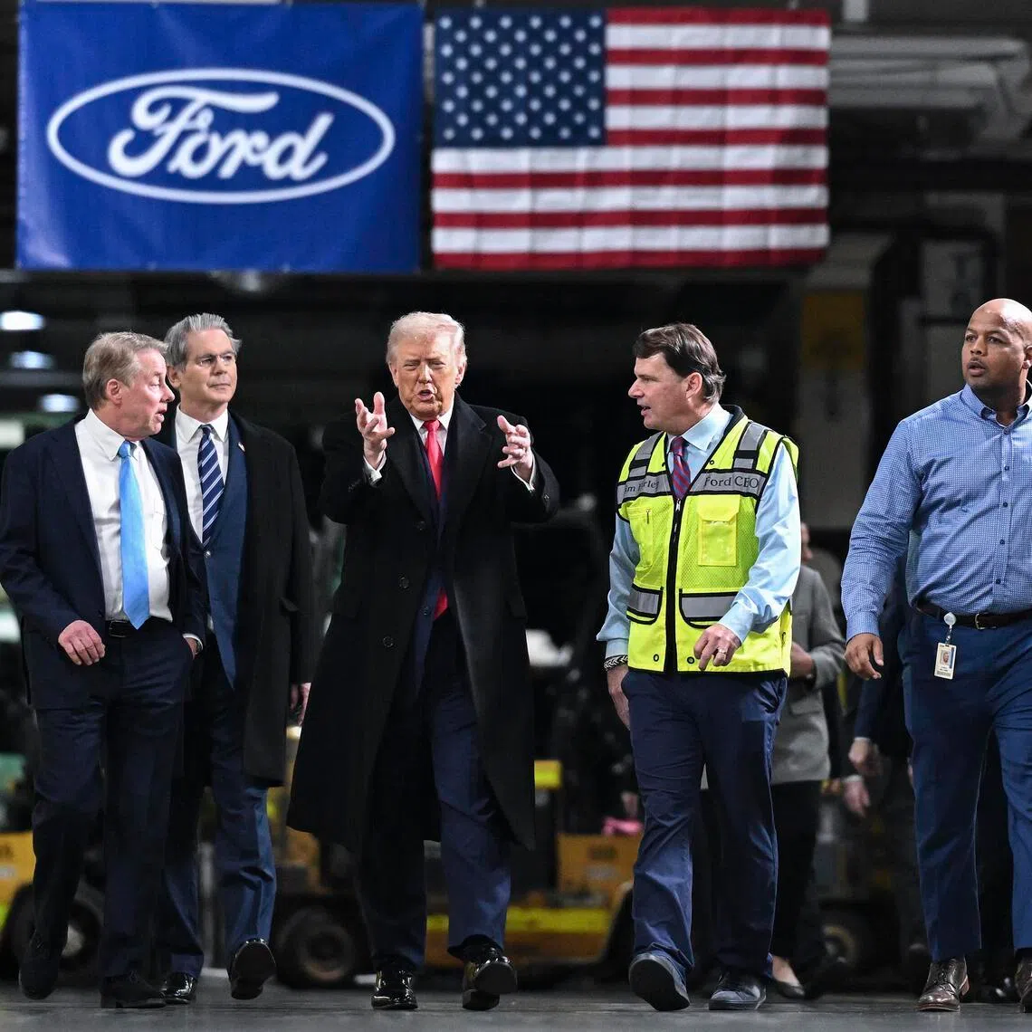 US President Donald Trump (centre) touring the Ford Motor Company's complex in Dearborn, Michigan., on Jan 13.