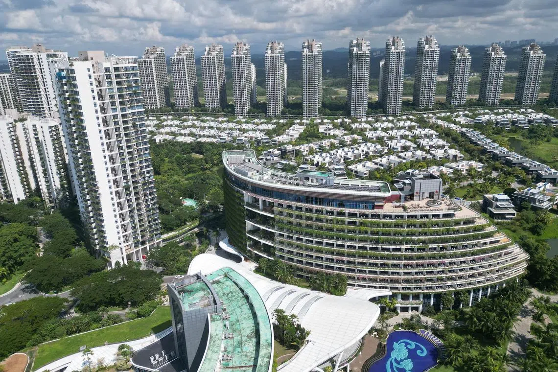 epa11036925 A picture taken with a drone shows an aerial view of Chinese developer Country Garden’s Forest City development in Johor Bahru, Malaysia, 14 December 2023 (issued 19 December 2023). Forest City, an ambitious urban project in Johor Bahru, Malaysia, built on reclaimed land near Singapore, was initiated in 2015 with major backing from the now financially unstable Chinese real estate giant Country Garden. The development aimed largely at the Chinese market, was targeted to house 700,000 residents across four reclaimed islands. However, it currently stands partially completed with a sparse population. The city, envisioned as a tropical paradise, now appears as a ‘Ghost City’, empty with deserted streets, closed shops, and underused facilities like a water park and beach. The project's struggle is compounded by isolation, the COVID-19 pandemic, administrative challenges, and Country Garden's looming default, casting uncertainty over the future of Forest City and its inhabitants.  EPA-EFE/HOW HWEE YOUNG