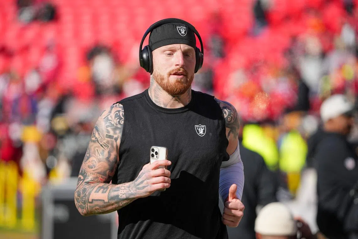 FILE PHOTO: Nov 29, 2024; Kansas City, Missouri, USA; Las Vegas Raiders defensive end Maxx Crosby (98) warms up against the Kansas City Chiefs prior go a game at GEHA Field at Arrowhead Stadium. Mandatory Credit: Denny Medley-Imagn Images/File Photo
