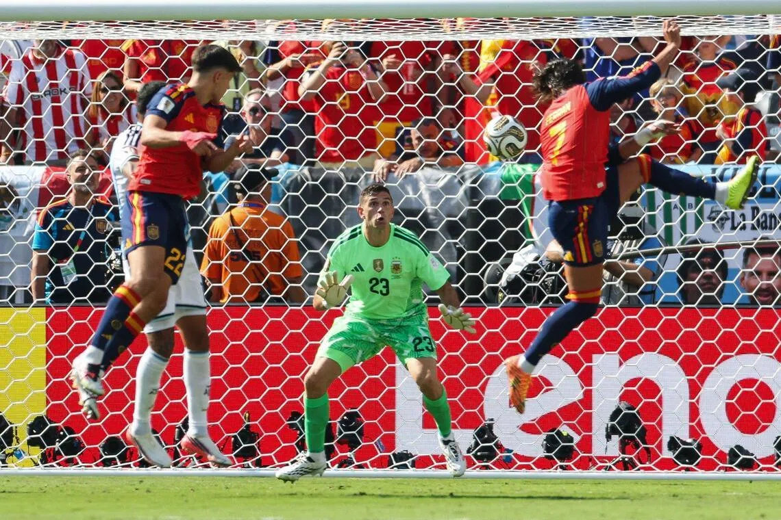 Argentina’s goalkeeper Emiliano Martinez (in green) in action on July 19.