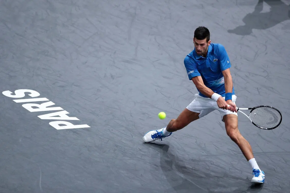 epa10284266 Novak Djokovic of Serbia in action during his match against Karen Khachanov of Russia at the Rolex Paris Masters 2022 Tennis Tournament in Paris, France, 03 November 2022.  EPA-EFE/CHRISTOPHE PETIT TESSON