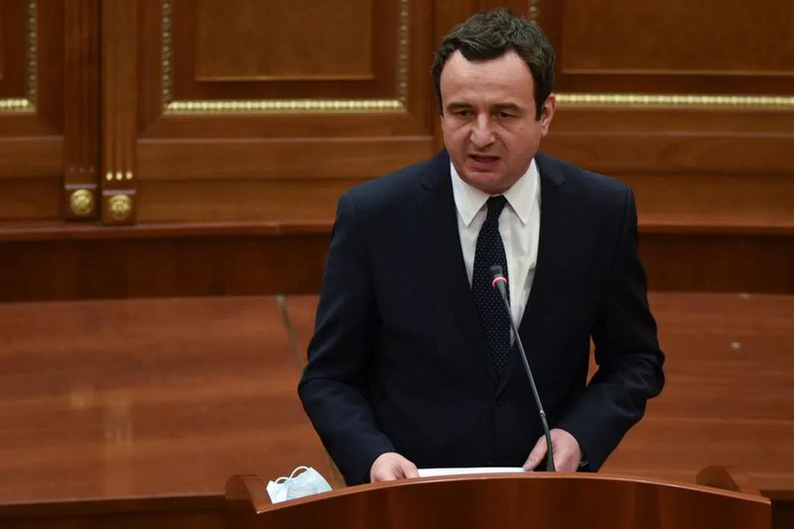 FILE PHOTO: Kosovo's newly elected Prime Minister Albin Kurti delivers his speech after taking an oath during a parliament session in Pristina, Kosovo March 22, 2021. REUTERS/Laura Hasani/File Photo