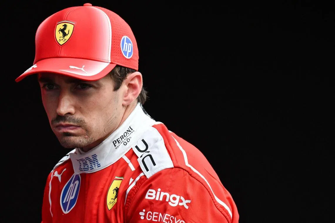 Second-placed Ferrari driver Charles Leclerc reacts before the podium ceremony after competing in the Formula One Belgian Grand Prix at the Spa-Francorchamps circuit.