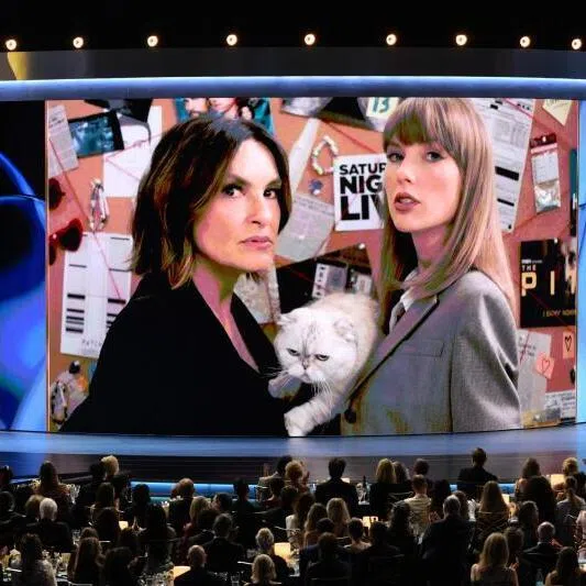 Mariska Hargitay, Taylor Swift, and her cat Olivia Benson appear on screen during the Emmy Awards on Sept 14.