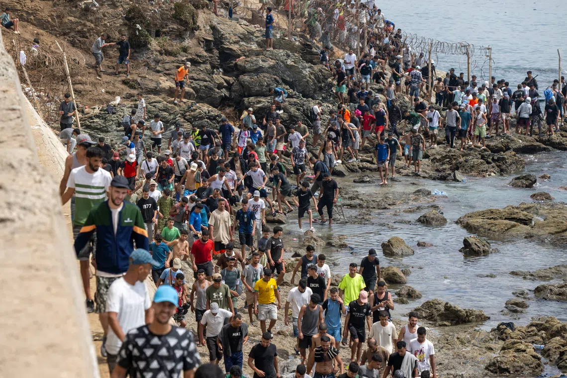 Spain said that of 72,000 people who entered the enclave from Morocco on July 30 and 31, all but 2,000 had returned