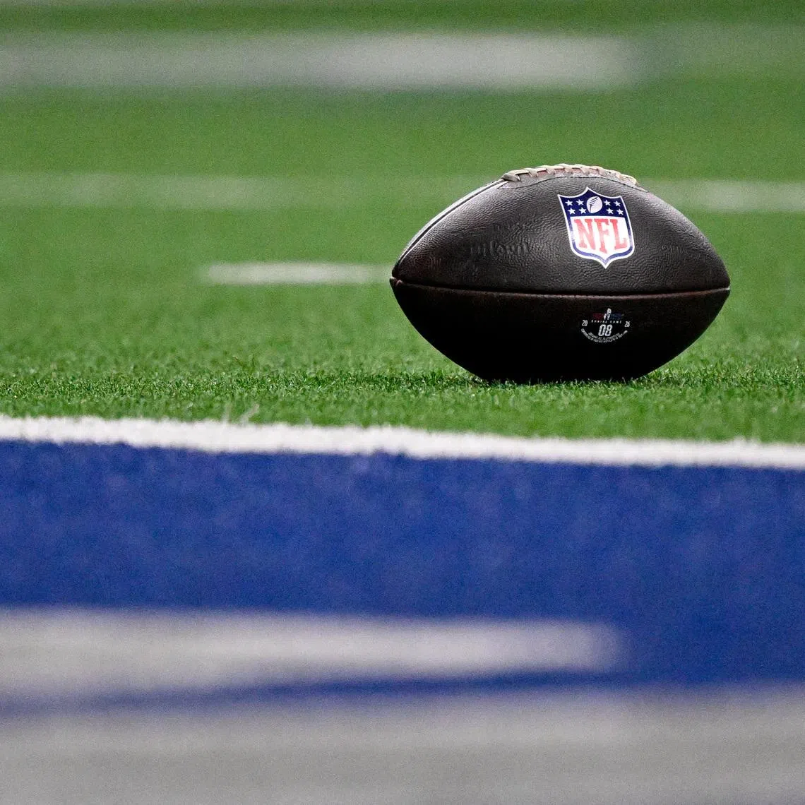 Jan 27, 2026; Frisco, TX, USA; A view of the NFL logo on a football at the goal line during the second half between the East and the West at the Ford Center at the Star. Mandatory Credit: Jerome Miron-Imagn Images
