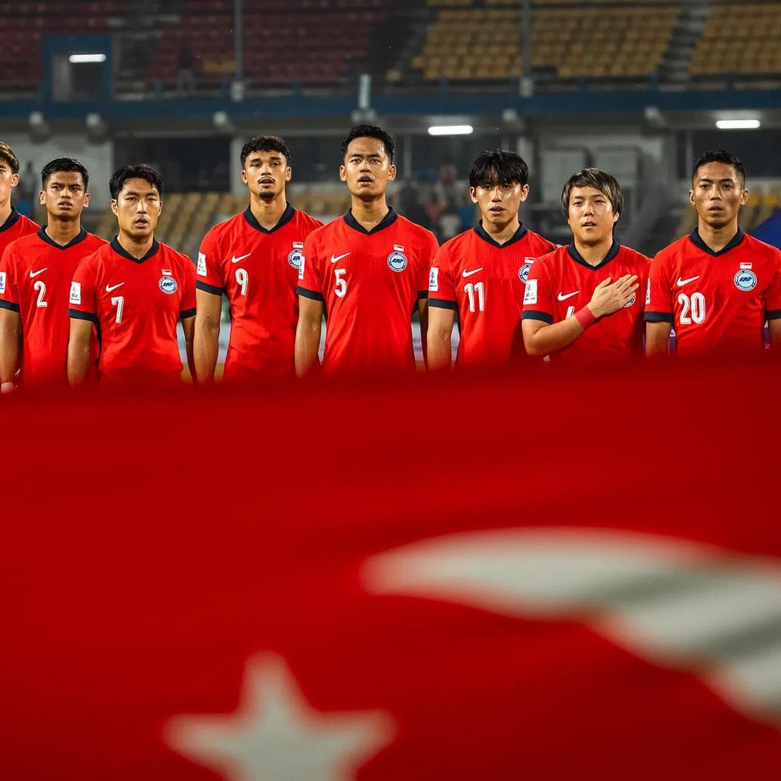 The Lions singing the Singapore national anthem before their 2-1 Asian Cup qualifying win at India on Oct 14.
