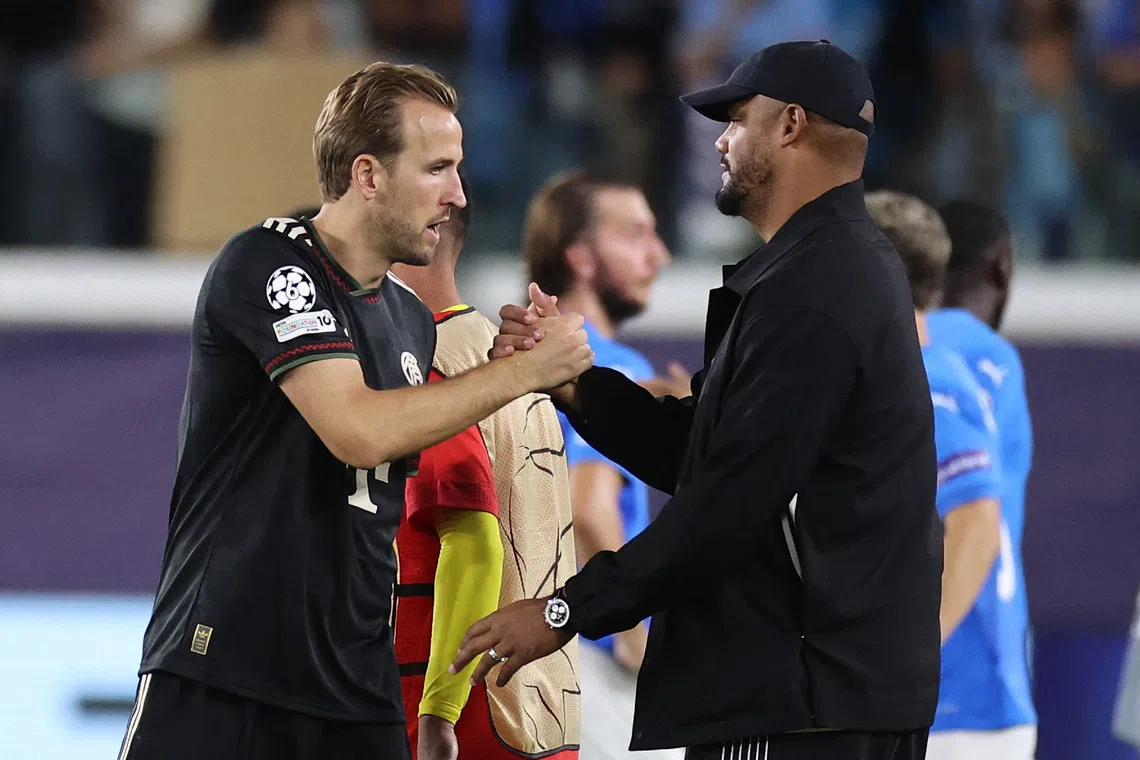 Soccer Football - UEFA Champions League - Pafos v Bayern Munich - Alphamega Stadium, Kolossi, Cyprus - September 30, 2025 Bayern Munich's Harry Kane shakes hands with Bayern Munich coach Vincent Kompany at the end of the match REUTERS/Yiannis Kourtoglou
