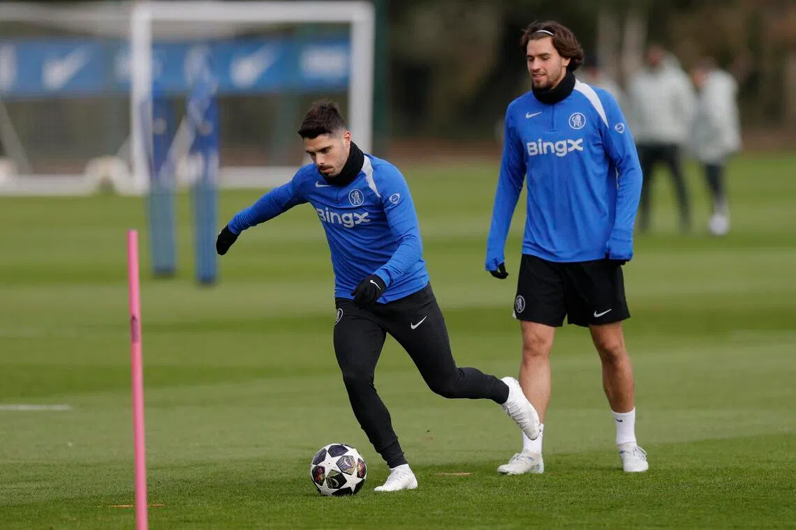 Chelsea's Pedro Neto (left) during training with Marc Guiu on March 16. Neto is free to play against PSG in the Champions League round of 16, second leg on March 17.
