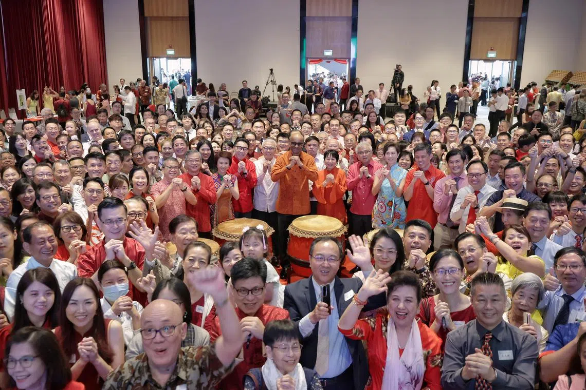 President Tharman Shanmugaratnam and his wife Jane Ittogi exchanging lunar new year greetings during Spring Reception 2024 at Singapore Chinese Cultural Centre on Feb 12, 2024. 