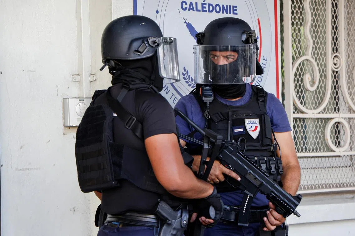 Police wait for the arrival of French President Emmanuel Macron at the central police station in Noumea, France's Pacific territory of New Caledonia on May 23, 2024. LUDOVIC MARIN/Pool via REUTERS