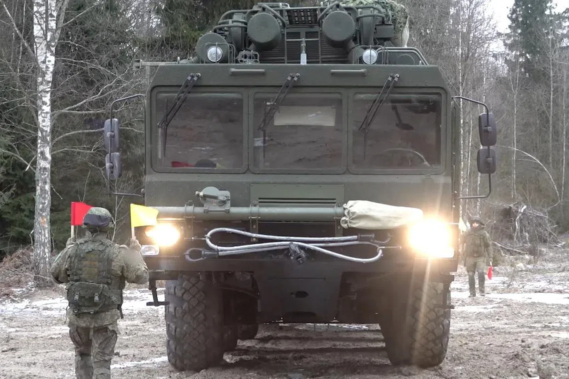 Service members take part in what Russian Defence Ministry says is the deployment of the Russian nuclear-capable hypersonic Oreshnik missile system in Belarus, at an unidetified location in this still image from video released December 30, 2025. Russian Defence Ministry/Handout via REUTERS