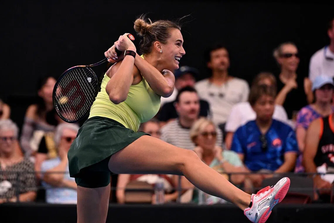 Aryna Sabalenka of Belarus hitting a return during her 6-3, 6-4 women's singles semi-final win over Karolina Muchova of the Czech Republic at the Brisbane International tennis tournament on January 10, 2026.