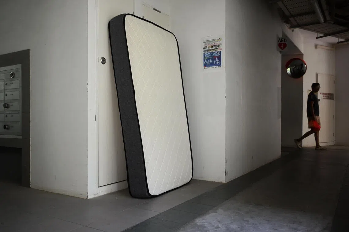 A mattress left at a void deck in Tampines Boulevard on May 5.