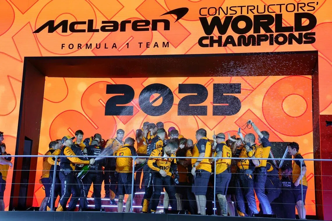 The McLaren team celebrates winning the constructor's title at the 2025 Formula One Singapore Airlines Singapore Grand Prix at the Marina Bay Street Circuit on Oct 5, 2025. 