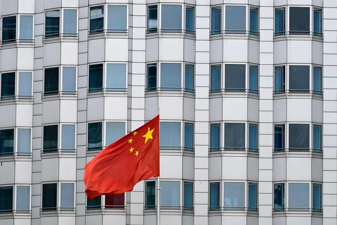 The two men, aged 32 and 29, were charged with providing prejudicial information to China in breach of the Official Secrets Act.