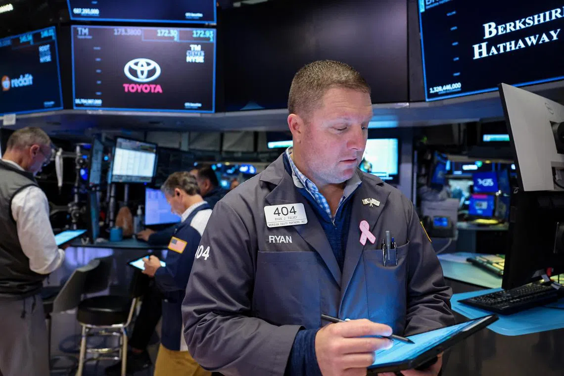 Traders working on the floor of the New York Stock Exchange, in New York City, on Nov 22.