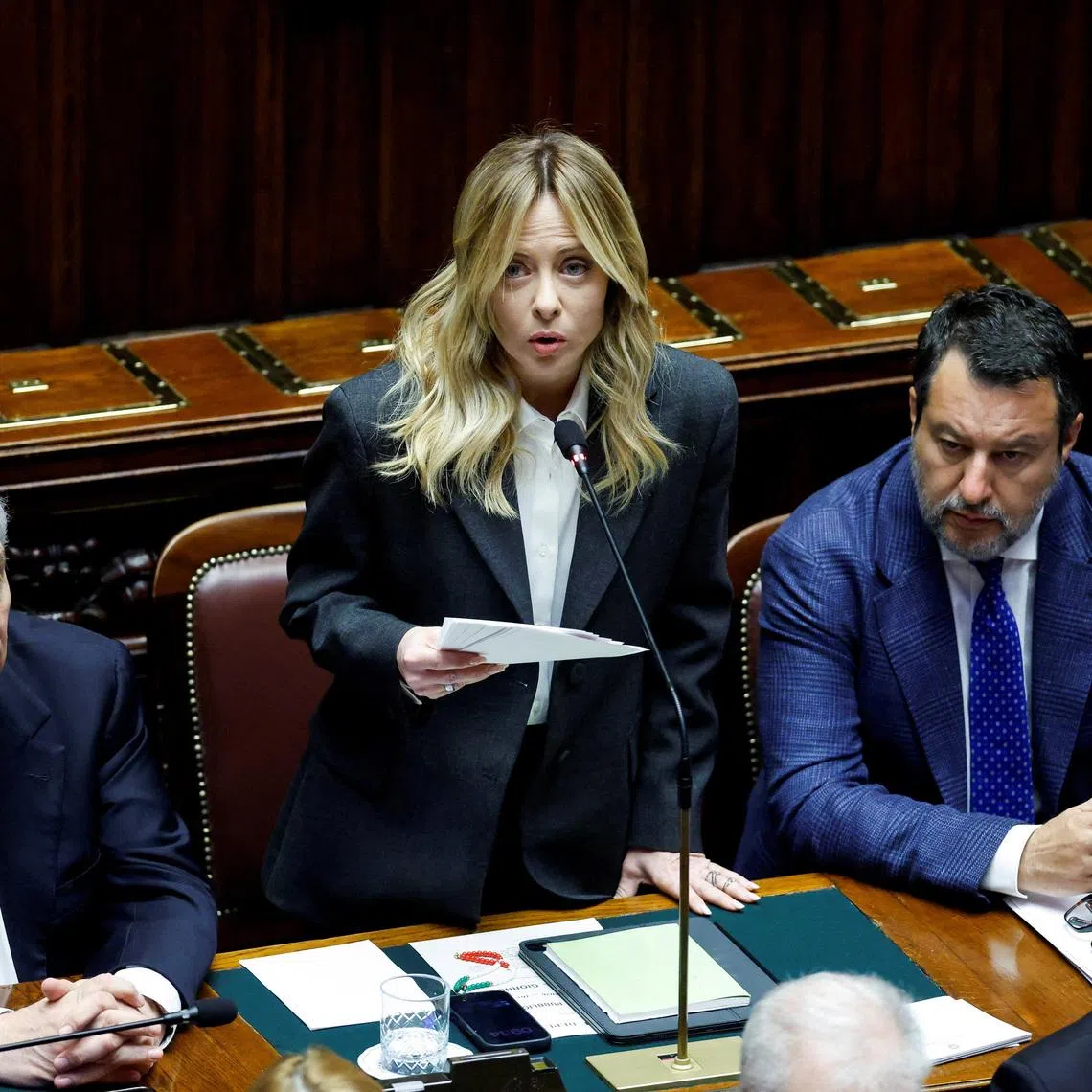 Italy's Prime Minister Giorgia Meloni speaks next to Italian Foreign Minister Antonio Tajani and Italy's deputy Prime Minister Matteo Salvini, to report on her government’s actions and is expected to speak on the latest developments in Iran, at the lower house of Parliament in Rome, Italy, April 9, 2026. REUTERS/Remo Casilli