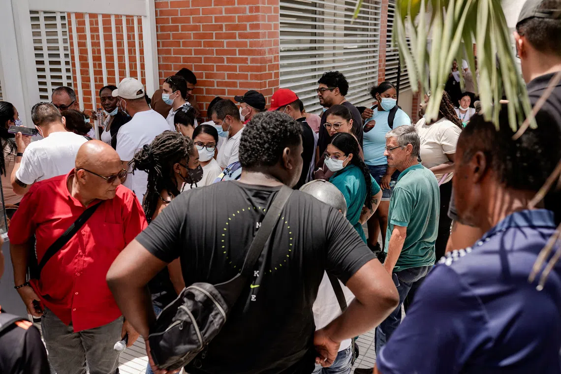 Relatives of the victims of the earthquake arrive to identify their loved ones.