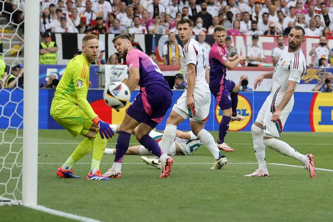 Joshua Kimmich coming close to scoring in Germany's 2-0 win over Hungary in their Euro 2024 Group A match in Stuttgart on June 19, 2024.