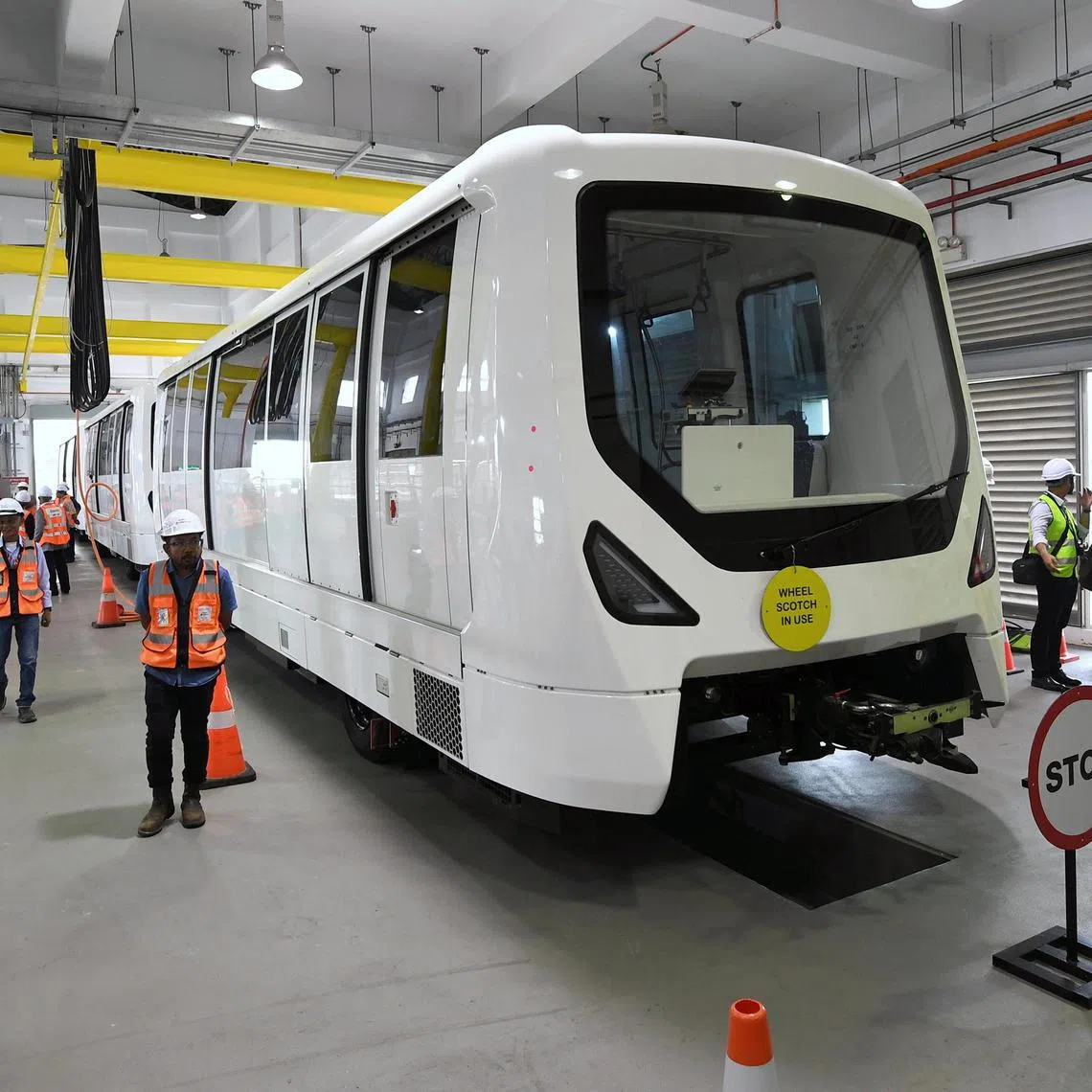 Members of the media viewing the new aerotrain during a test run at KLIA.
