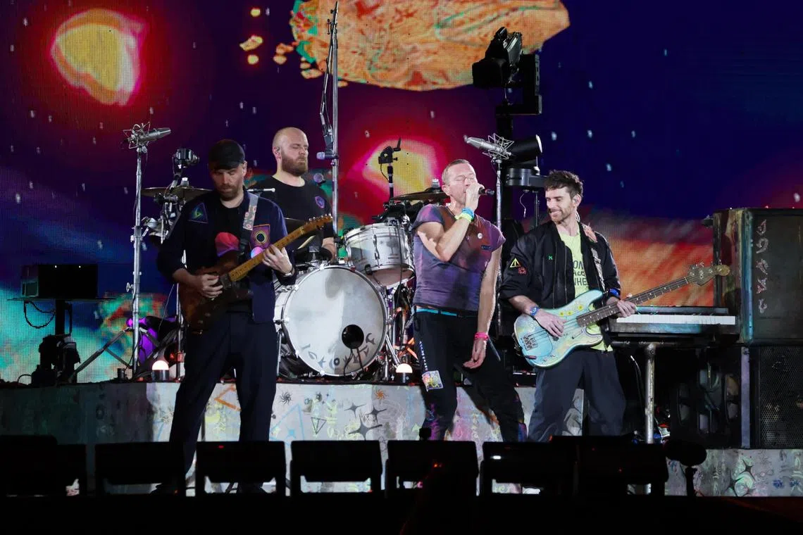 Four people were arrested for their suspected involvement in scams involving tickets to concerts of Taylor Swift, Coldplay (above), Yoasobi, Joker Xue, and Enhypen.