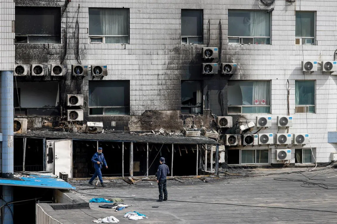 Some of the hospital’s windows appeared blackened and at least one was broken, with soot marks visible on parts of the facade.