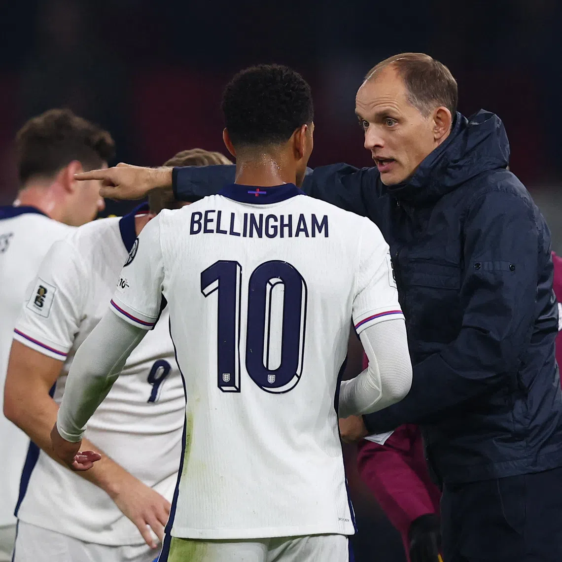 Soccer Football - World Cup - UEFA Qualifiers - Group K - Albania v England - Air Albania Stadium, Tirana, Albania - November 16, 2025 England manager Thomas Tuchel talks to Jude Bellingham REUTERS/Florion Goga