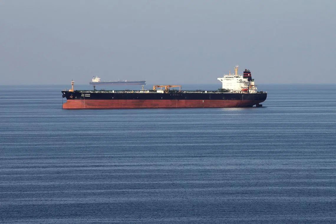 FILE PHOTO: Oil tankers pass through the Strait of Hormuz, December 21, 2018. REUTERS/Hamad I Mohammed/File Photo