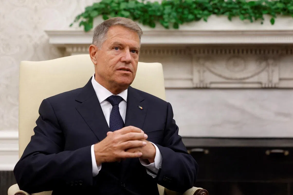 Romanian President Klaus Iohannis meets U.S. President Joe Biden in the Oval Office at the White House in Washington, U.S., May 7, 2024. REUTERS/Evelyn Hockstein/File Photo