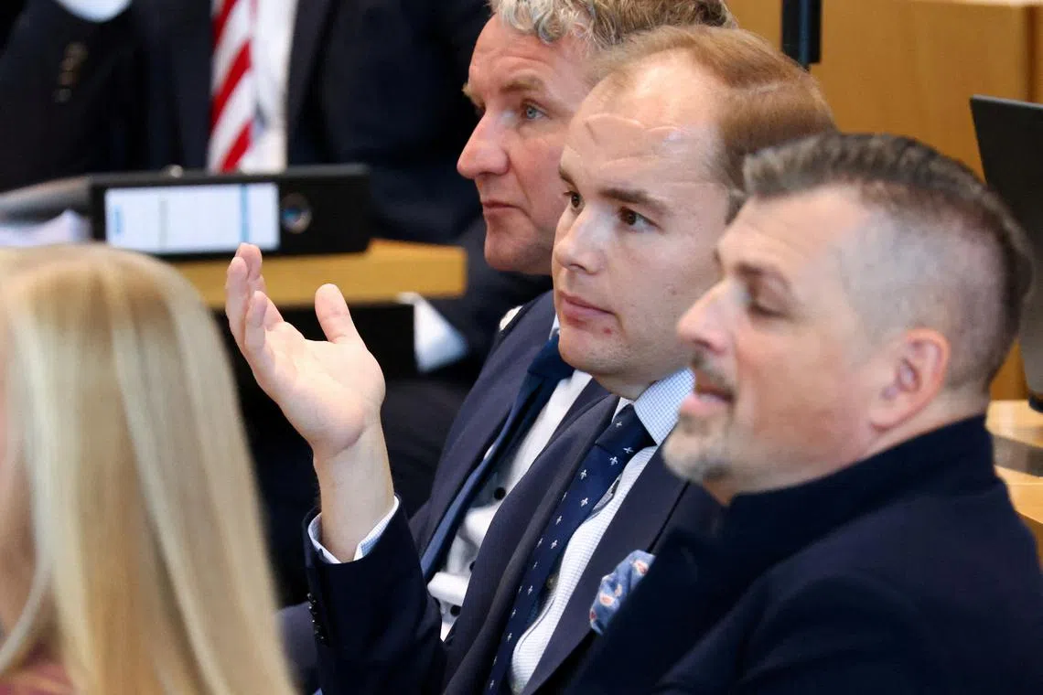 FILE PHOTO: Bjoern Hoecke, leader of the far right-wing Alternative for Germany party (AFD) in the federal state of Thuringia, and Torben Braga of the AFD attend the constitutional session of the state parliament, a few weeks after the AFD emerged as the strongest party, in Erfurt, Germany, September 28, 2024. REUTERS/Christian Mang/File Photo