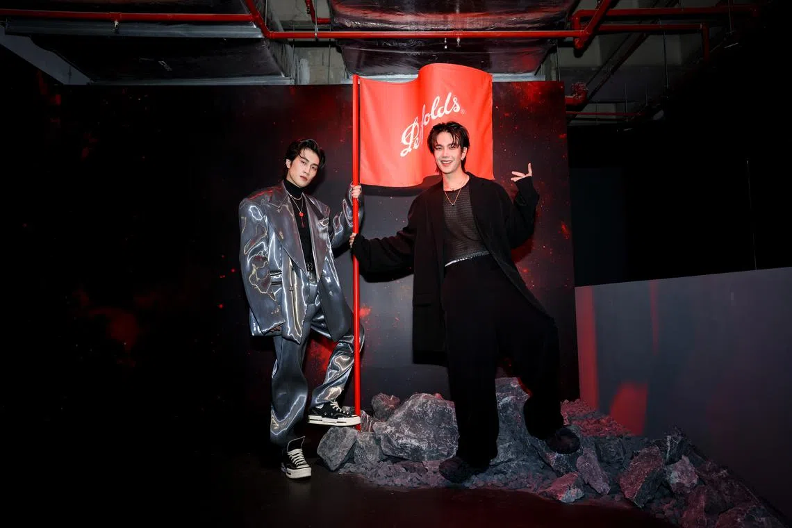 Bible Wichapas Sumettikul (left) and Build Jakapan Puttha shot to fame playing supporting characters in KinnPorsche.