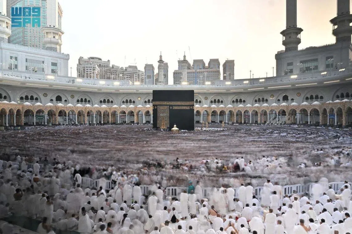 Muslims performing Umrah on the 27th day of the holy month of Ramadan in the Grand Mosque in the holy city of Mecca, Saudi Arabia, March 27, 2025. 