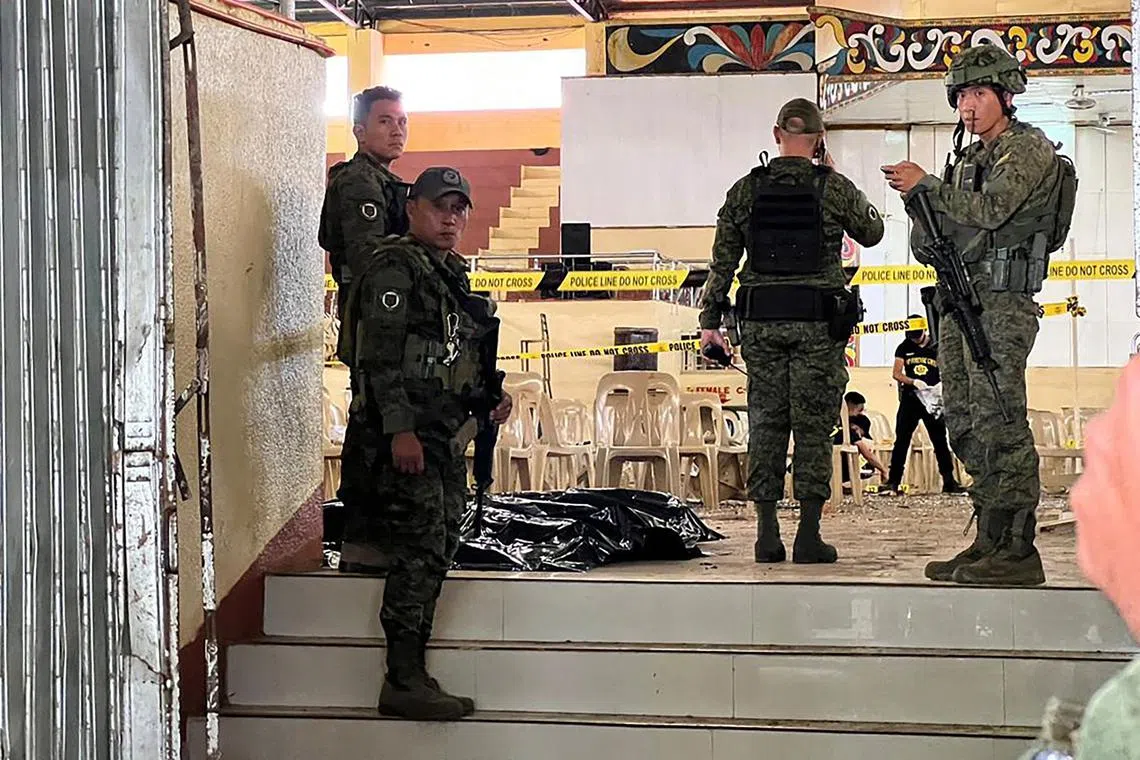 Four people were killed in a bombing at a Catholic Mass in Marawi, the Philippines, on Dec 3.