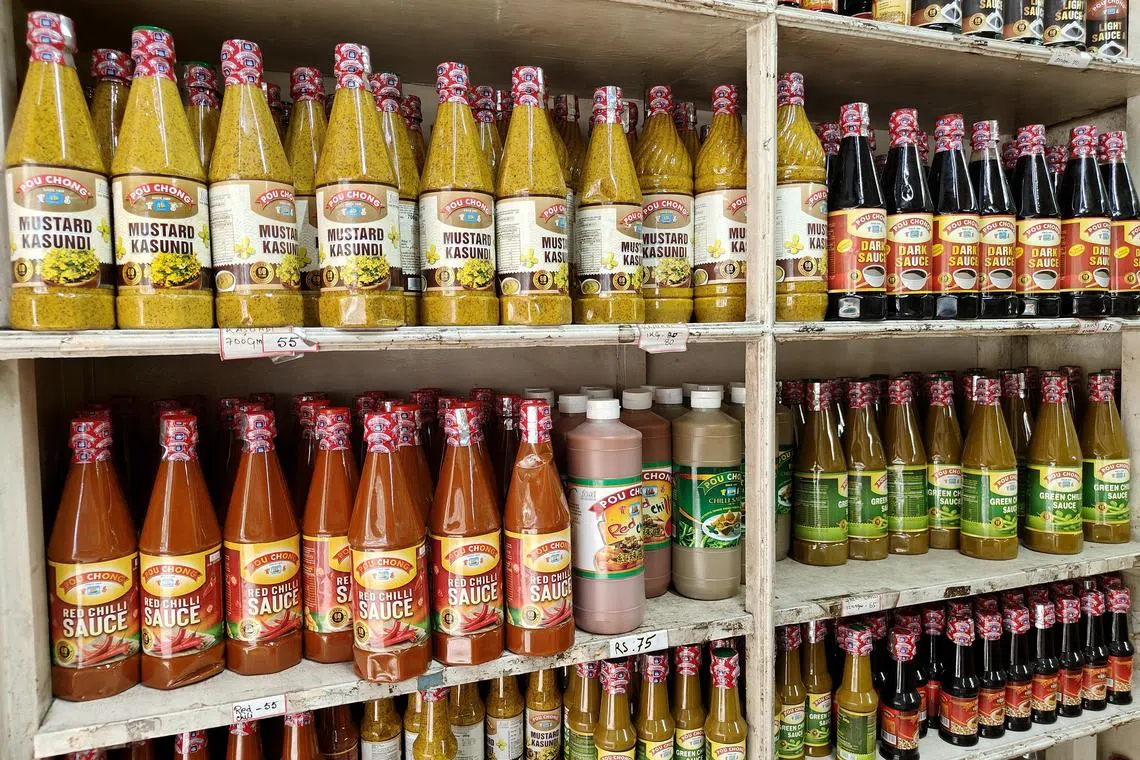 ddletter29 - IMG20240621135701 and IMG20240619180302: A view of the array of Pou Chong's sauces. Credit: Debarshi Dasgupta