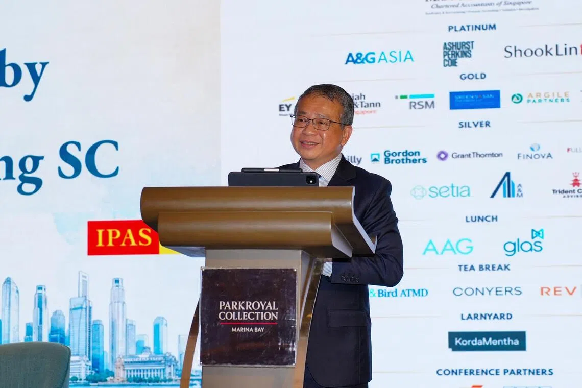Law Minister Edwin Tong speaking at the Singapore Insolvency Conference on Oct 21.