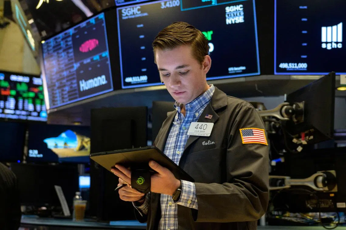 Traders work the floor of the New York Stock Exchange, in New York City.