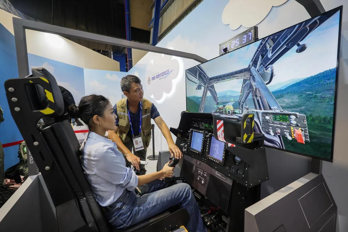 Visitors can experience what it is like to steer an Apache attack helicopter at the RSAF booth.