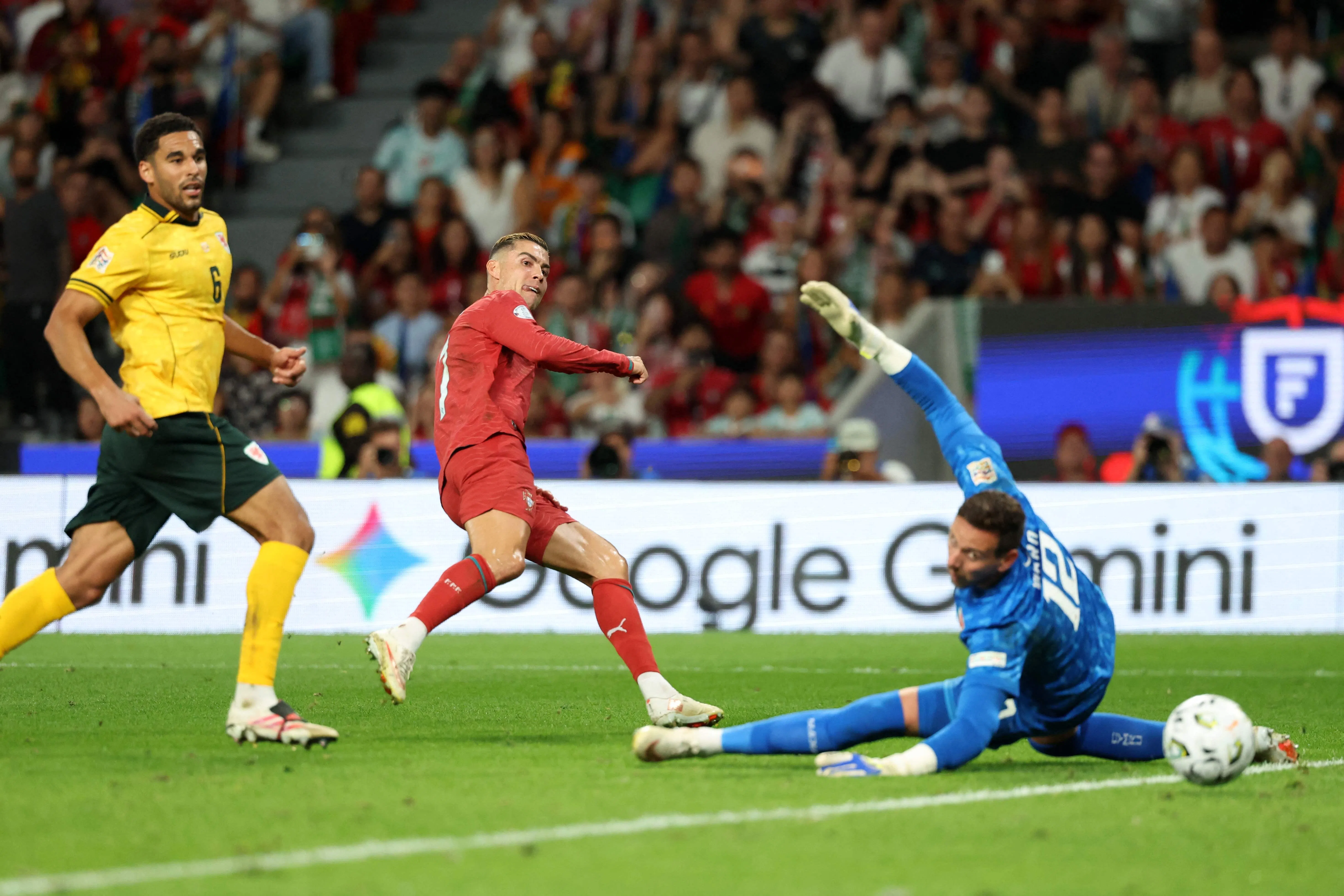 Portugal’s Cristiano Ronaldo (centre) scores a goal that was later disallowed.