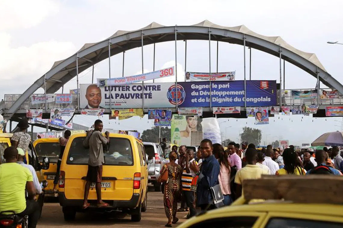 Taxis drive along the street after the announcement by Congo's election board to postpone a presidential vote scheduled for Sunday by one week, in Kinshasa, Democratic Republic of Congo, December 20, 2018. REUTERS/Kenny Katombe/File Photo