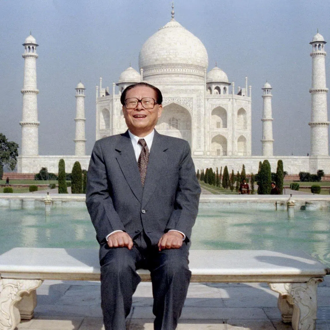 Jiang Zemin posing for a photo in front of the Taj Mahal in Agra, India, on Nov 30, 1996. 