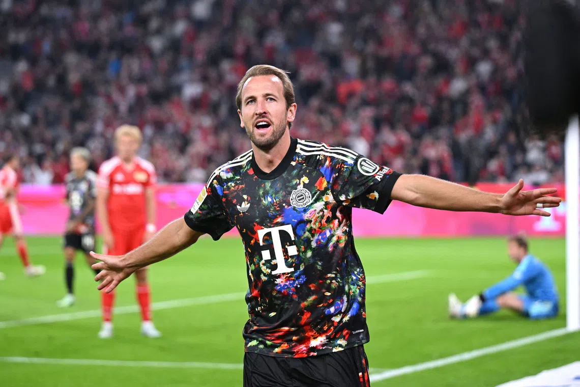 Bayern Munich’s Harry Kane celebrates scoring their fourth goal against Union Berlin.